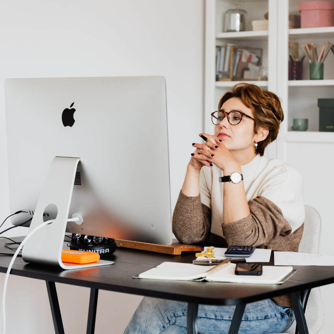 Woman at her computer working on a self-paced course